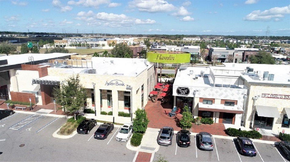 Hamlin commercial development with entertainment options within walking distance of the community